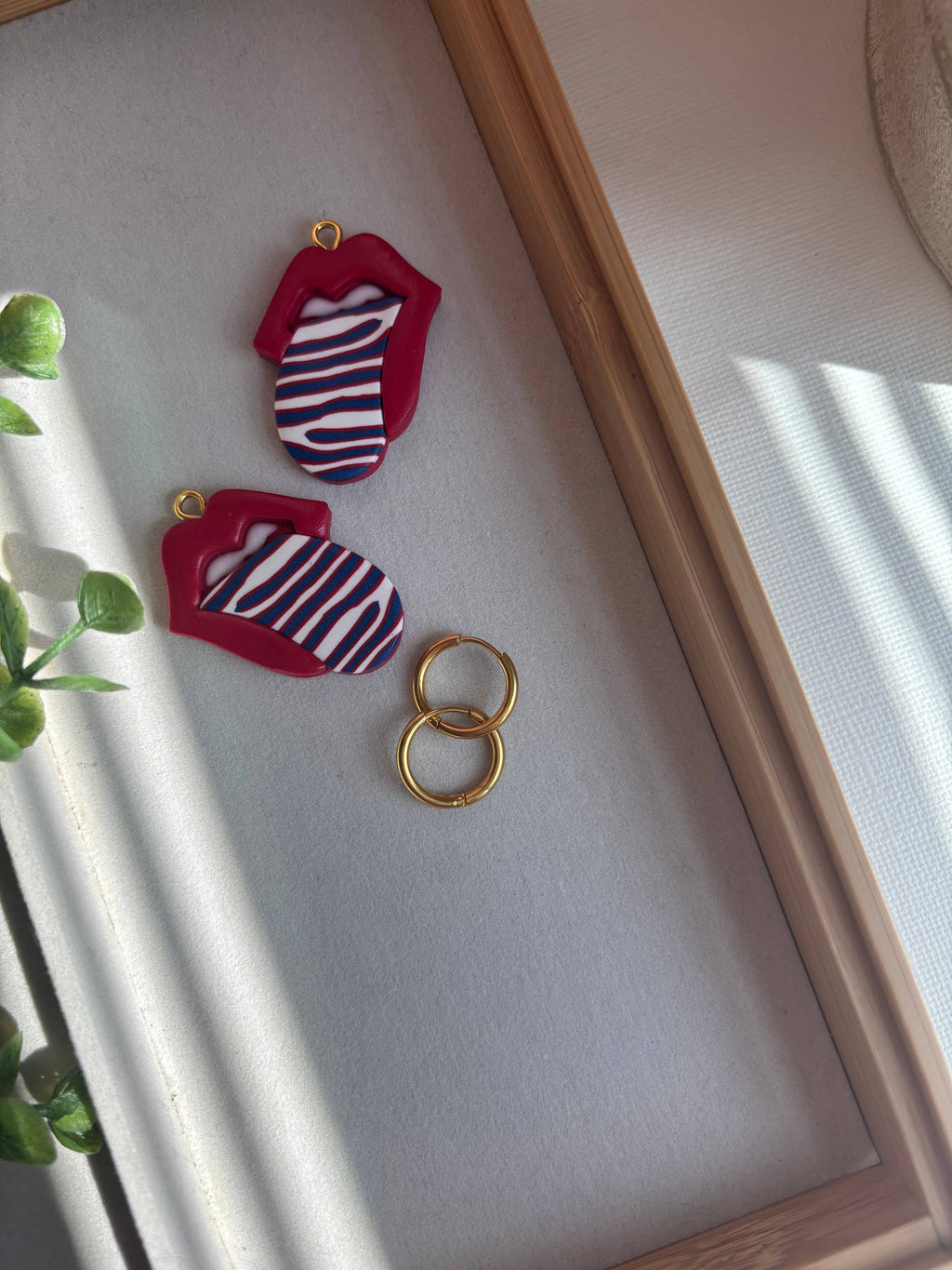 Buffalo Bills dangle earrings, tongue out earrings